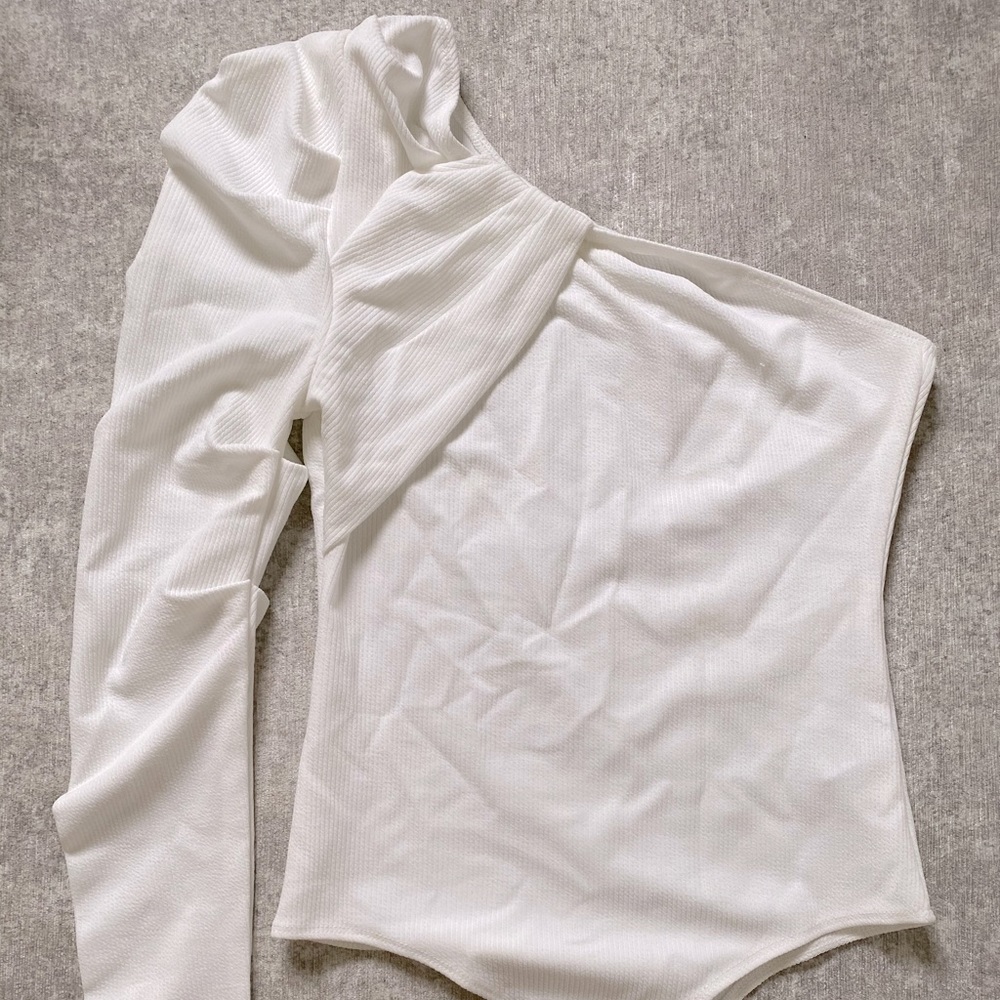Asymmetrical body suit